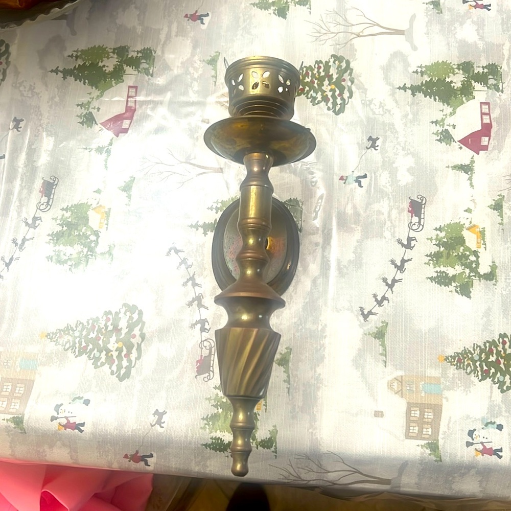 One antique brass wall candle sconce